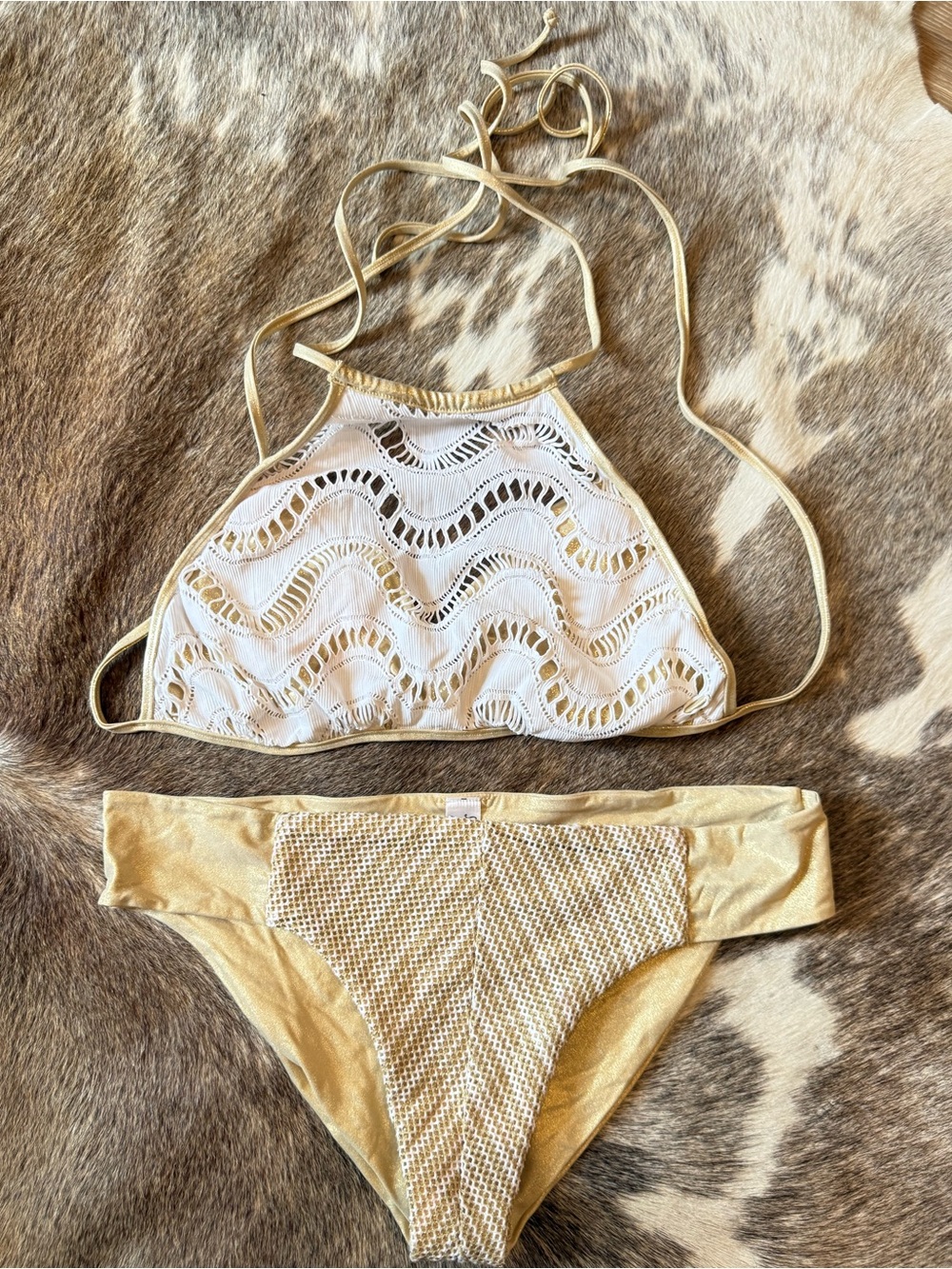 Luli Fama Gold and White Lace Halter Bikini Set. Small top, large bottoms.